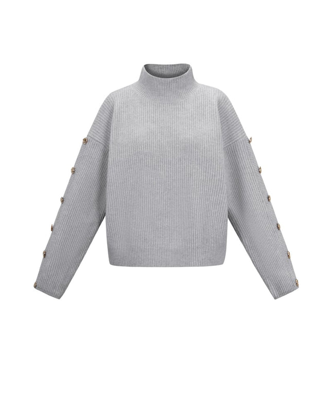 Trui met knopen op de mouwen