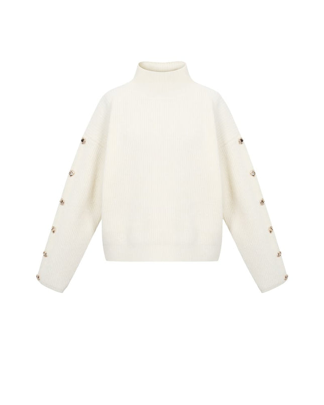 Trui met knopen op de mouwen