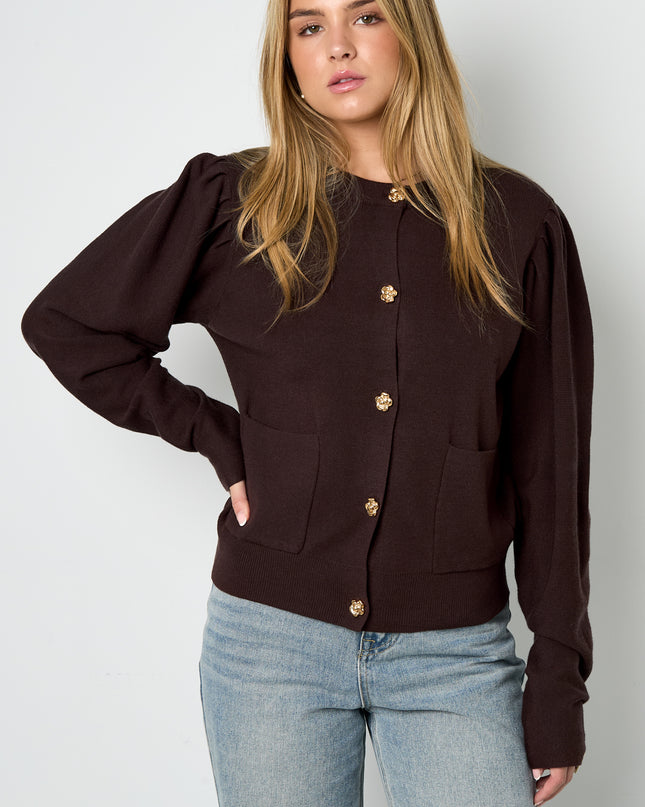 Vest met bloemen knopen