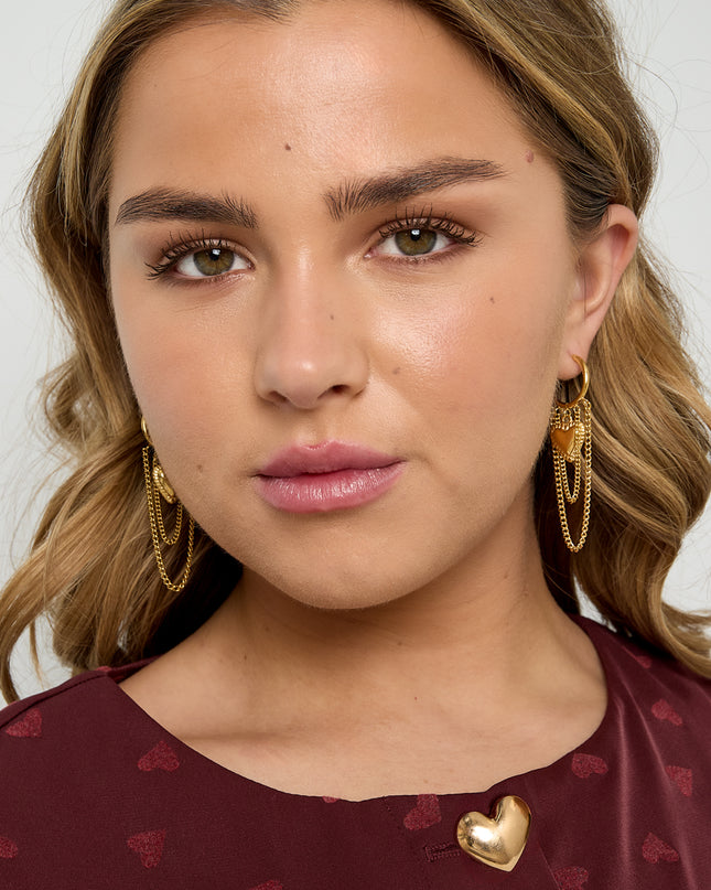 Creolen met hangende kettingen en hart