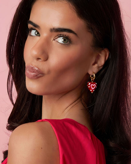 Oorbellen met hanger versierd hart