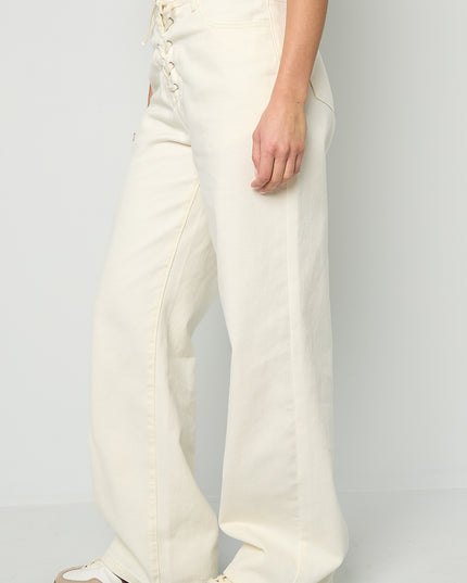 Jeans met vetersluiting