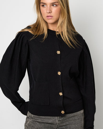 Vest met bloemen knopen