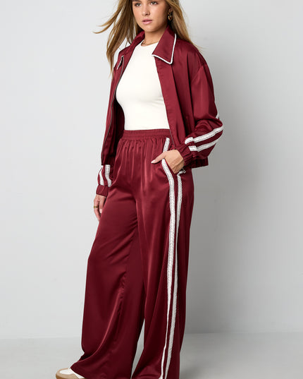 Sportieve broek met satijnen look