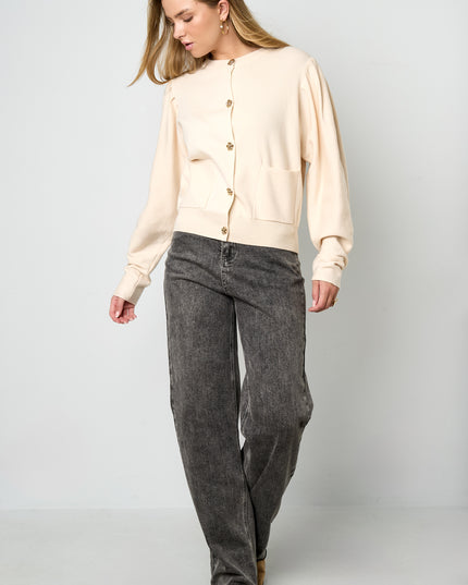 Vest met bloemen knopen