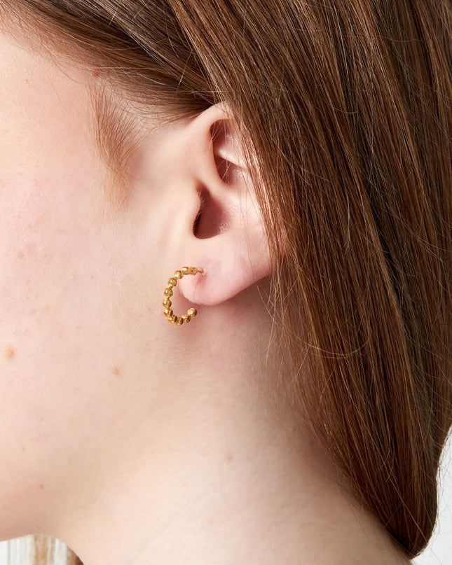 Glanzende kraal clip oorbellen