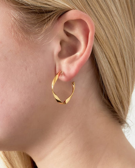 Grote gebogen clip oorbellen