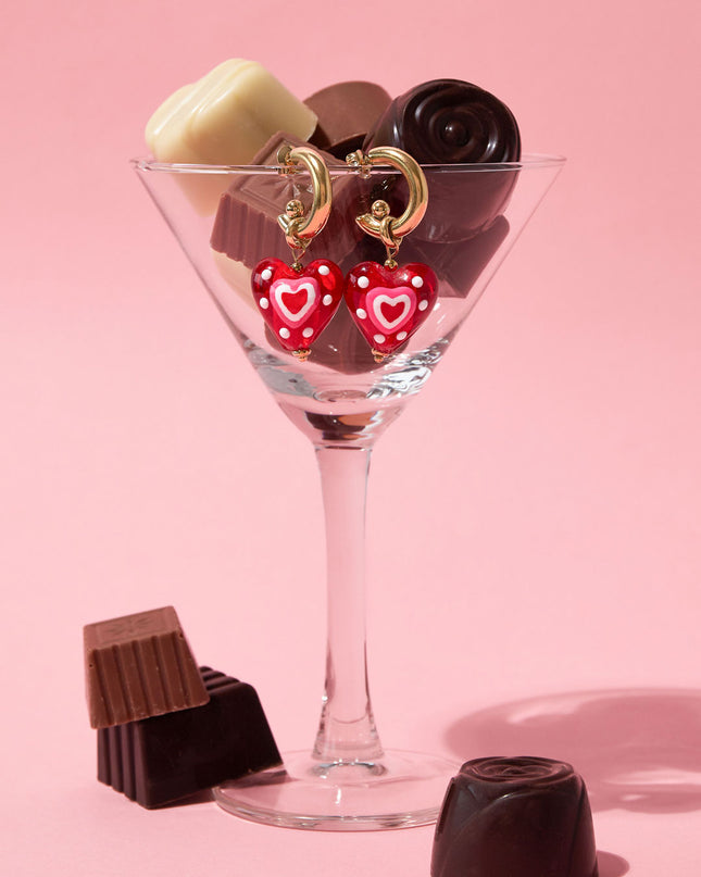 Oorbellen met hanger versierd hart