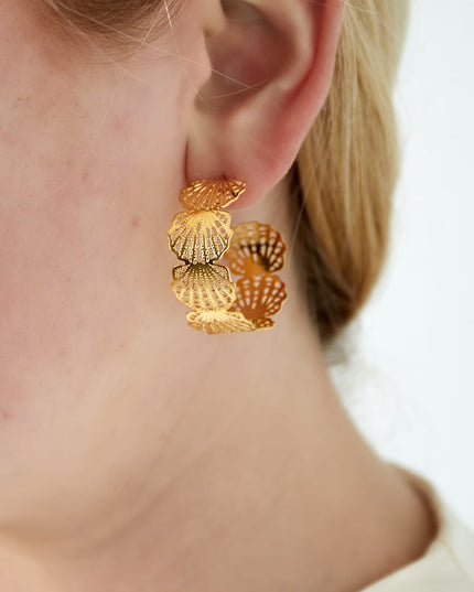 Oorbellen met schelpen