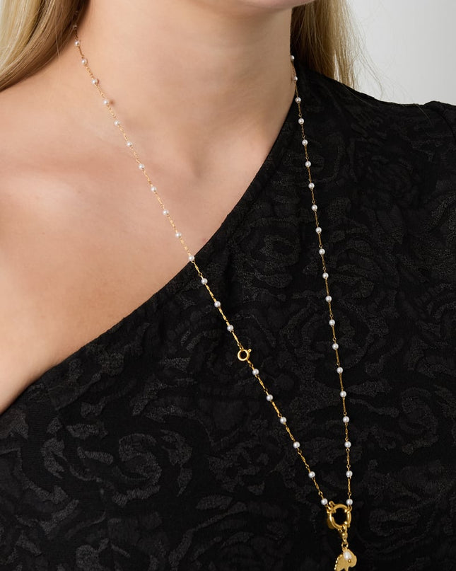 Slot met parelketting