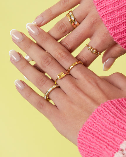 Hoekige ring met steentjes en parelmoer detail