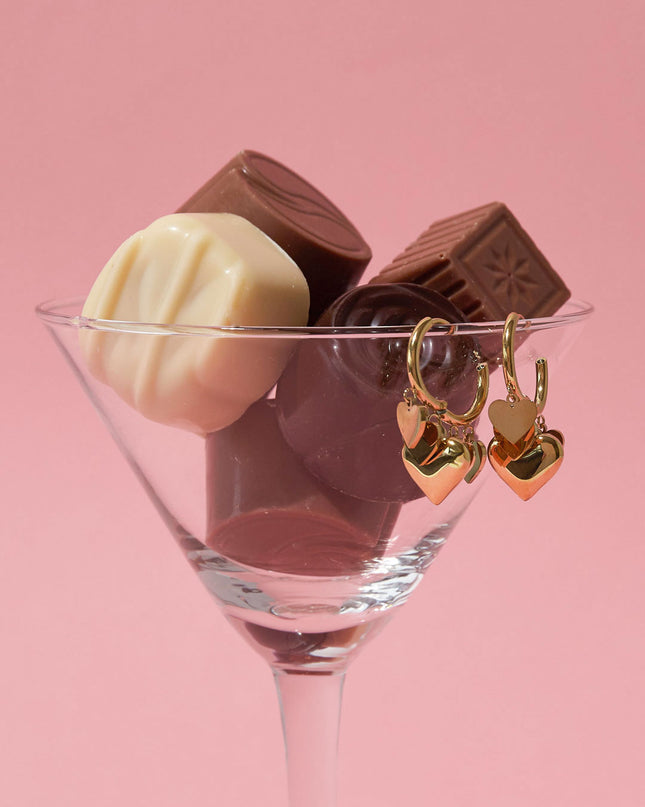 Oorringetjes met verschillende maten harten hangers