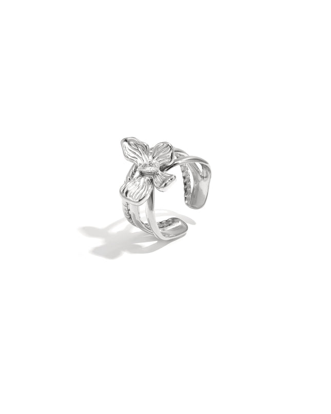 Gelaagde statement ring met bloem en steen
