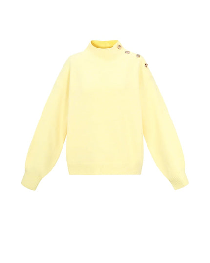 Trui met knopen op de schouder