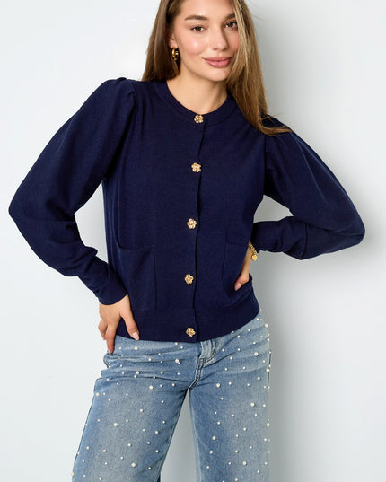 Vest met bloemen knopen