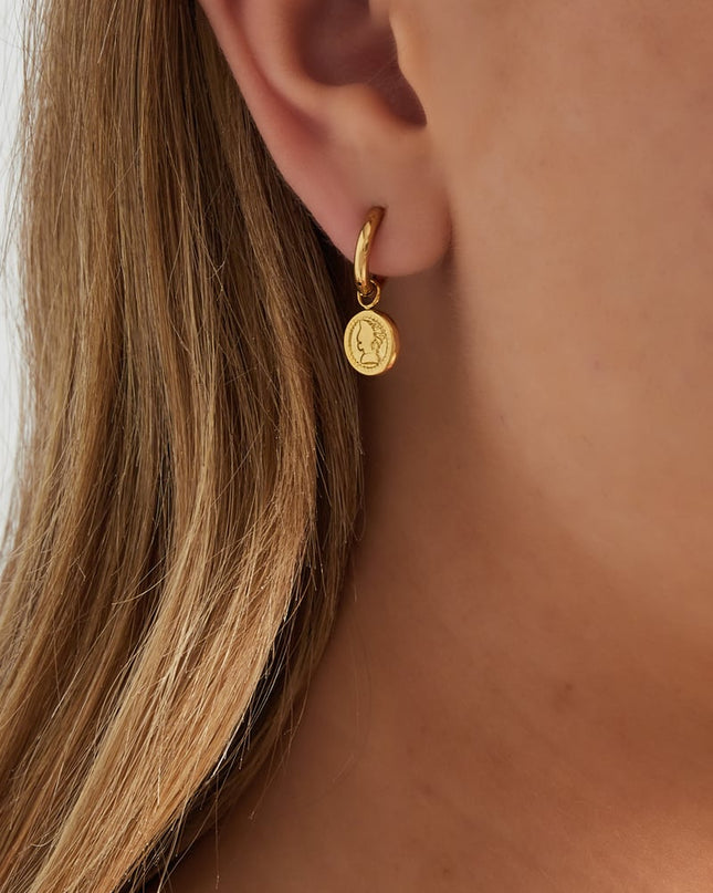 Muse munten oorbellen