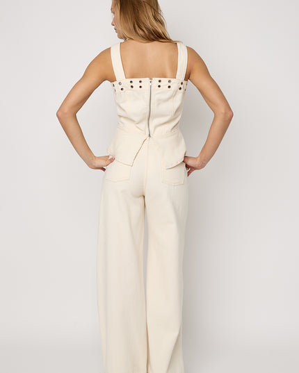 Opvallende denim top met oogjes